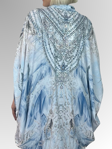 Sparkle and shine in our Selena Wrap Jacket! This kaftan style jacket features dazzling diamante trim, adding a touch of bling to your look. The relaxed and flowing design makes it perfect for any occasion. Made with easy-care polyester, it's the perfect piece to dress up and party in style!