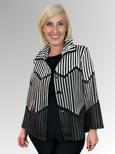 Elevate your style with the Julia Ribbon Trim Jacket - a statement piece designed to turn heads. The innovative wire-enhanced collar moulds perfectly to your liking, while the ribbon trim detailing adds an elegant touch. Crafted from a blend of polyester and elastane, this jacket is both versatile and striking. For long-lasting style, hand wash with care.