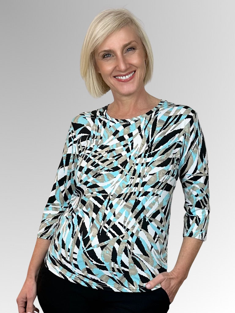 Our Amazon 3/4 Sleeve Classic Top is made from a luxurious slinky jersey. Featuring an abstract leaf design in mint, beige, black and white tones, this stylish print looks great on its own or team it with a jacket in a co-ordinating colour to make it pop! Made in Australia from Polyester Spandex it washes and drip-dries with no ironing required.