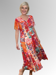 Introducing the Araya Godet Dress by Orientique! Made from soft, sustainable rayon, this dress features hand painted Persian and Oriental motifs in a gorgeous mix of jade, watermelon and peach tones. The crinkle fabric is oh-so-comfy with no ironing required. Featuring short sleeves, a flattering V-neckline and godet panels through the skirt that create a beautiful drape and swing. Perfect for summer, this cool and flowy dress is a must-have addition to your wardrobe.