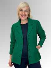 Elevate your wardrobe with this stunning Boiled Wool Blazer in rich green. Made from Woolmark certified wool,&nbsp;it delivers exceptional warmth and durability without compromise. The classic design works perfectly for both casual and everyday wear. With handy pockets for practicality, this blazer is a versatile piece you'll reach for again and again.