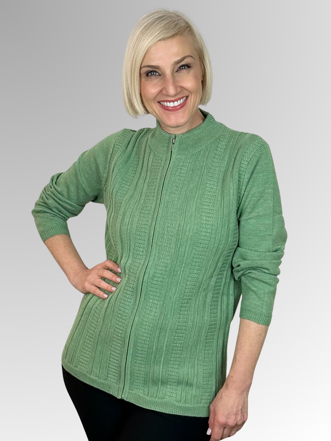 Slade Knitwear is a well-known Australian brand with a 70-year history of creating high-quality knitwear for women. This Pistachio Zip Front Cardigan, made from 100% Wool, is a sporty and versatile addition to any outfit. Slade is the go-to for all your winter knitwear needs!