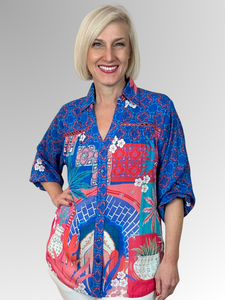 The Lula Soul Busena 3/4 Sleeve Overshirt is a standout piece for summer, showcasing a vibrant print and a timeless collar design. Detailed with intricate cutout embroidery on both the front and back, this lightweight overshirt is made from luxuriously soft viscose, ensuring comfort throughout the day. An ideal choice for elevating your warm-weather collection with a refined yet lively flair.