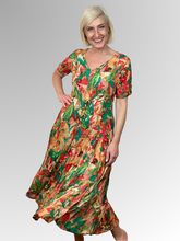Introducing the Sao Paulo Godet Dress by Orientique! Made from soft, sustainable rayon, this dress features a hand painted leaf print in a gorgeous array of colours. The crinkle fabric is oh-so-comfy with no ironing required. Featuring short sleeves, a flattering V-neckline and godet panels through the skirt that create a beautiful drape and swing.&nbsp;Perfect for summer, this cool and flowy dress is a must-have addition to your wardrobe.