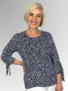 Indulge in sophisticated style with the Corsican Avalon Tie Sleeve Top. Made in Australia from polyester and spandex, this easy-care navy and white print top is perfect for any occasion. Its stylish design combines function and fashion for a timeless, tasteful look that will never go out of style.