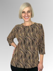 Make a statement in our Black and Gold Flame Top! With 3/4 sleeves and eye-catching gold metallic thread, you'll be turning heads everywhere you go! Ready for a night out? This stretchy polyester spandex number is sure to razzle and dazzle with its oh-so-stylish flame pattern.