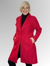 Wrap yourself in luxury with our Boiled Wool Red Pea Coat. Certified with the prestigious Woolmark label, this modern, soft boiled wool coat is both warm and stylish. Featuring a contemporary take on the classic coat, it's the perfect statement piece for any fashion-forward wardrobe. Upgrade your look and embrace true quality.