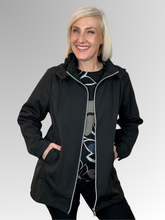 The Apex Jacket in black is your go-to layer for unpredictable weather. Crafted from durable polyester, it features a detachable hood for flexible coverage, a zip front for easy on-and-off, and practical pockets to keep essentials close. Lined with soft fleece for added warmth, it's designed to keep you warm and dry. An adjustable drawstring band cinches at the waist for a custom fit. Whether you're running errands or heading out for the day, this everyday jacket delivers reliable protection and style.