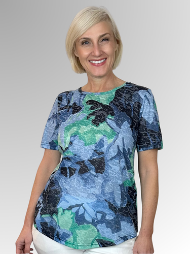Stay cool and comfortable in the Chambray Tee by Sportswave, crafted from a soft burnout fabric blending polyester and elastane. Its lightweight, breathable texture makes it perfect for sunny days and easy outings, while the rich tones add a stylish touch. Effortlessly casual and fun, this tee lets you enjoy the season with relaxed, playful vibes.