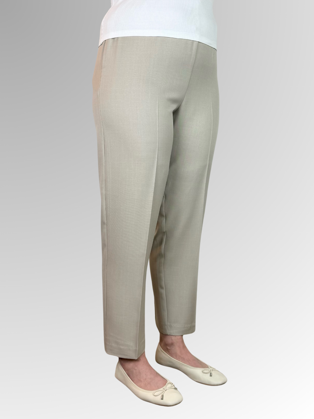 Our popular Petite Length Summer Pant by Jillian offers a perfect combination of stretch, style, and comfort. Made in Australia from Polyester, these pants feature side seam pockets and a waistband that is flat in the front with elastic sides and back. The slim leg design and ideal length make them a go-to choice for those tired of constant pant alterations.