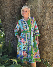 The Sante Fe Collared Tie Dress is your summer staple. This stylish knee-length dress features a classic collar, button-through front, and a tie waist belt that flatters your figure. Made from 100% organic cotton with 3/4 length sleeves, it's perfect for casual outings or special occasions.