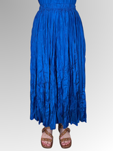 Embrace effortless elegance with the Blue Lux Crinkle Skirt by Escape. Perfectly complementing your warm-weather wardrobe, this maxi-length skirt is crafted from premium, breathable rayon that offers a beautiful, fluid drape and a subtle satin-like luster. It features a signature crinkle texture that provides a naturally low-maintenance finish; perfect for travel and busy days since it requires absolutely no ironing.
