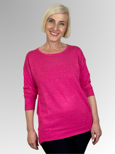 Get ready to shimmer and shine in our Hot Pink Twinkle Pullover! Made from a luxurious wool and viscose blend, this soft and fine knit sweater features a relaxed fit and playful twinkling stud details. Perfect for adding that touch of fun to any outfit.