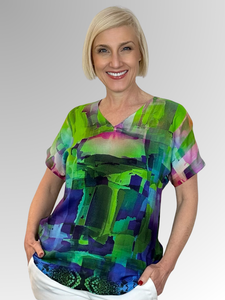 Look great and feel even better in this luxurious Modal V-Neck top. Its stylish Dynamic print and ideal sleeve length make this top perfect for the fashionable woman who wants to stand out from the crowd. Featuring a range of unique colourful designs, you’ll be sure to turn heads.