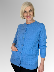 For 70 years, Slade Knitwear has been a trusted and iconic Australian brand, offering high-quality and timeless women's knitwear. Crafted from 100% Pure Wool, this Blue Basket Stitch Cardigan features two pockets for convenience and is a must-have classic for winter. Look no further than Slade for all your knitwear needs.