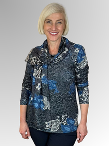 Keep cozy and chic with our Azure Long Sleeve Leaf Top. This top boasts a classic cut and is made from a warm blend of polyester and elastane. The vibrant hues and elegant print add a timeless touch to any outfit. Don't wait too long to snag a matching scarf as a bonus with purchase - only while supplies last!