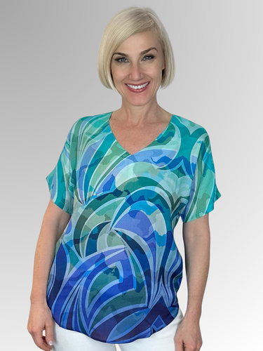 Look great and feel even better in this luxurious Modal V-Neck top. Its stylish Waves design and ideal sleeve length make this top perfect for the fashionable mature woman who wants to stand out from the crowd. Featuring a range of unique colourful designs, you’ll be sure to turn heads.