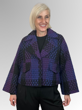 The Elena Wang Crosshatch Purple Jacket combines effortless style with thoughtful design. Crafted from a luxurious polyester and wool blend, this piece features a relaxed cropped boxy silhouette that flatters every frame. Flared sleeves add a contemporary edge, while full lining delivers a polished, refined finish. Perfect for elevating casual and dressed-up looks alike, this fashionable jacket is a versatile wardrobe essential that works with everything.