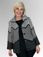 Elevate your style with the Julia Ribbon Trim Jacket - a statement piece designed to turn heads. The innovative wire-enhanced collar moulds perfectly to your liking, while the ribbon trim detailing adds an elegant touch. Crafted from a blend of polyester and elastane, this jacket is both versatile and striking. For long-lasting style, hand wash with care.