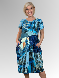 Get ready to feel cool and look amazing this summer with Orientique's Tower Blue Bubble Dress! Made from Certified Organic Cotton and featuring a unique hand-drawn design inspired by scenery and motifs from around the world, this dress is perfect for the season. Whether you're out and about or lounging in the sun, stay comfortable and stylish all summer long.