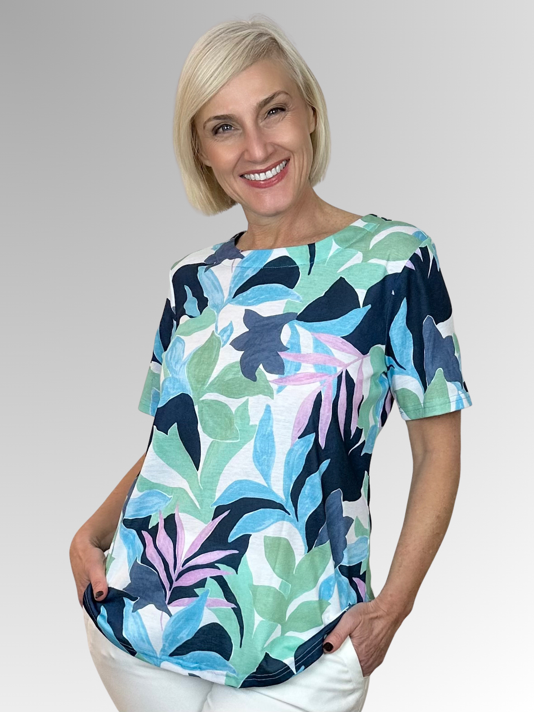 Stay cool and carefree in the Lagoon Tee by Jillian, featuring a lush leafy print that brings fresh vibes to any outfit. Crafted from a comfortable blend of polyester and elastane, its relaxed fit moves with you all day long. Perfect for adding a playful touch to your casual wardrobe!