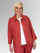 Meet the Button-Through Linen Resort Jacket in Rust, your new go-to layer for effortless, everyday style. Crafted from 100% pure linen, this lightweight jacket combines a relaxed, breezy silhouette with tailored details. It features a classic shirt collar and a full button-down front, making it easy to wear open over a tank or closed as a structured shirt. Designed for ultimate versatility, the sleeves come with built-in tab-and-button cuffs so you can easily roll them up on warmer days.