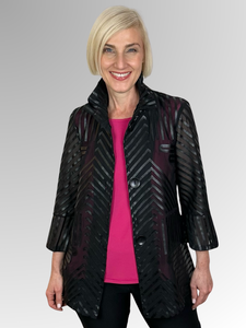 Evoke glamour in our sophisticated Maglia Jacket. Its wire-enhanced frill neck moulds to your liking, while faux leather trim detailing adds an elegant touch. With bell sleeves and a polyester elastane blend, this jacket is both luxurious and versatile. Hand wash for long-lasting style.