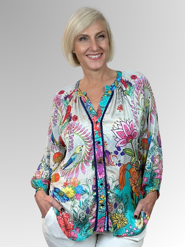 The Lesante 3/4 Sleeve Overshirt by Lula Soul offers a pretty and feminine style with its flouncy silhouette and delicate floral print featuring birds. Crafted from silky viscose, it feels smooth against the skin and is perfect worn open over a coordinating camisole for a playful, breezy look.