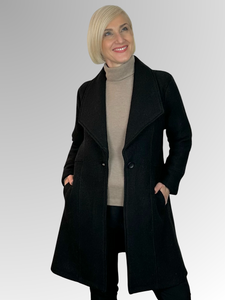 Wrap yourself in luxury with our Boiled Wool Black Pea Coat. Certified with the prestigious Woolmark label, this modern, soft boiled wool coat is both warm and stylish. Featuring a contemporary take on the classic coat, it's the perfect statement piece for any fashion-forward wardrobe. Upgrade your look and embrace true quality.