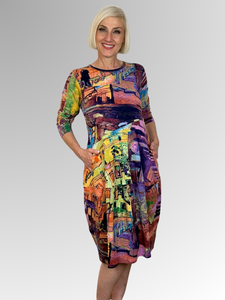 Stay comfortable and stylish this autumn/winter in the Stones Multi Long Sleeve Bubble Dress. Made by Orientique's talented artists, this dress is hand sketched and made from 100% Organic Cotton. Featuring a striking multicoloured abstract pattern, their exclusive designs draw inspiration from around the world. Soft and easy to wear, this dress is perfect for transitioning to the cooler weather.
