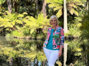 Show your unique style with this comfortable and easy-to-wear jacket. Orientique is known for vibrant colours and thoughtfully designed pieces that stay modern and on trend. The Scooter Long Sleeve Jacket, crafted from a Cotton and Spandex blend, features a colourful European streetscape print, making it a versatile and stylish addition to your wardrobe.