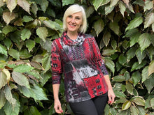 The Jessica Long Sleeve Burnout Top combines effortless style with understated elegance. A luxurious cowl neckline and spliced detailing in the front creates visual interest, while the rich crimson and black burnout fabric catches the light beautifully. Crafted from rayon, polyester, and spandex, this top delivers comfort and durability in a relaxed silhouette that flatters every shape. Versatile enough to transition from day to evening, it works beautifully layered or worn alone.
