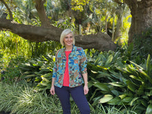 Crafted from organic cotton, the Orientique Tayrona Long Sleeve Jacket features a colourful tropical print and raw edge fringed trim for a modern, effortless look. This versatile piece works perfectly as a light layer, making it easy to mix and match with your wardrobe. Embrace style and comfort with a jacket designed to stand out while keeping you comfortable all day.