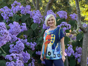 Elevate your wardrobe with the Bagoraz Fortunata Top, crafted in Portugal for women who cherish vibrant colour, fine detailing and outstanding comfort. Made from an ultra-soft blend of viscose and elastane, this relaxed yet refined top showcases delicate spliced accents, enhanced by elegant stitch and stud embellishments along the neckline, delivering a polished and sophisticated aesthetic. Allow Bagoraz to introduce a subtle yet captivating touch to your look.