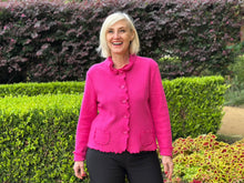 Indulge in sophistication with our Boiled Wool Pink Ruffle Trim Jacket, featuring the Woolmark emblem as a mark of excellence for Pure New Wool. This luxurious and plush design will add a touch of style and warmth to your winter ensembles.