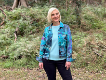 Embrace your individuality with this fun, easy to wear jacket! Orientique delivers with vibrant colours, exquisite craftsmanship, and modern yet comfortable designs. Made by Orientique's talented artists, the Stones Teal Long Sleeve Print Jacket boasts a cozy blend of Cotton/Spandex and a striking abstract pattern in a rich multicoloured design.