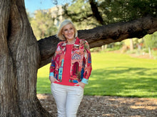 Elevate your everyday look with the Rabat Long Sleeve Jacket by Orientique. Beautifully crafted from a comfortable cotton-spandex blend, it showcases a striking design inspired by Moroccan architecture and landscapes. True to Orientique's signature style of vibrant colours and thoughtful, modern design, this easy-wearing piece is a reliable and stylish staple you will reach for time and again.