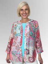 Get ready for summer with Renoma's Patch 3/4 Sleeve Blouse. This breezy blouse boasts a delicate, feminine print that's effortless to match. With a fashionable cut away round neck and 3/4 sleeves, you'll stay chic and comfy all day long. Crafted from a blend of viscose and nylon, this top is a must-have!