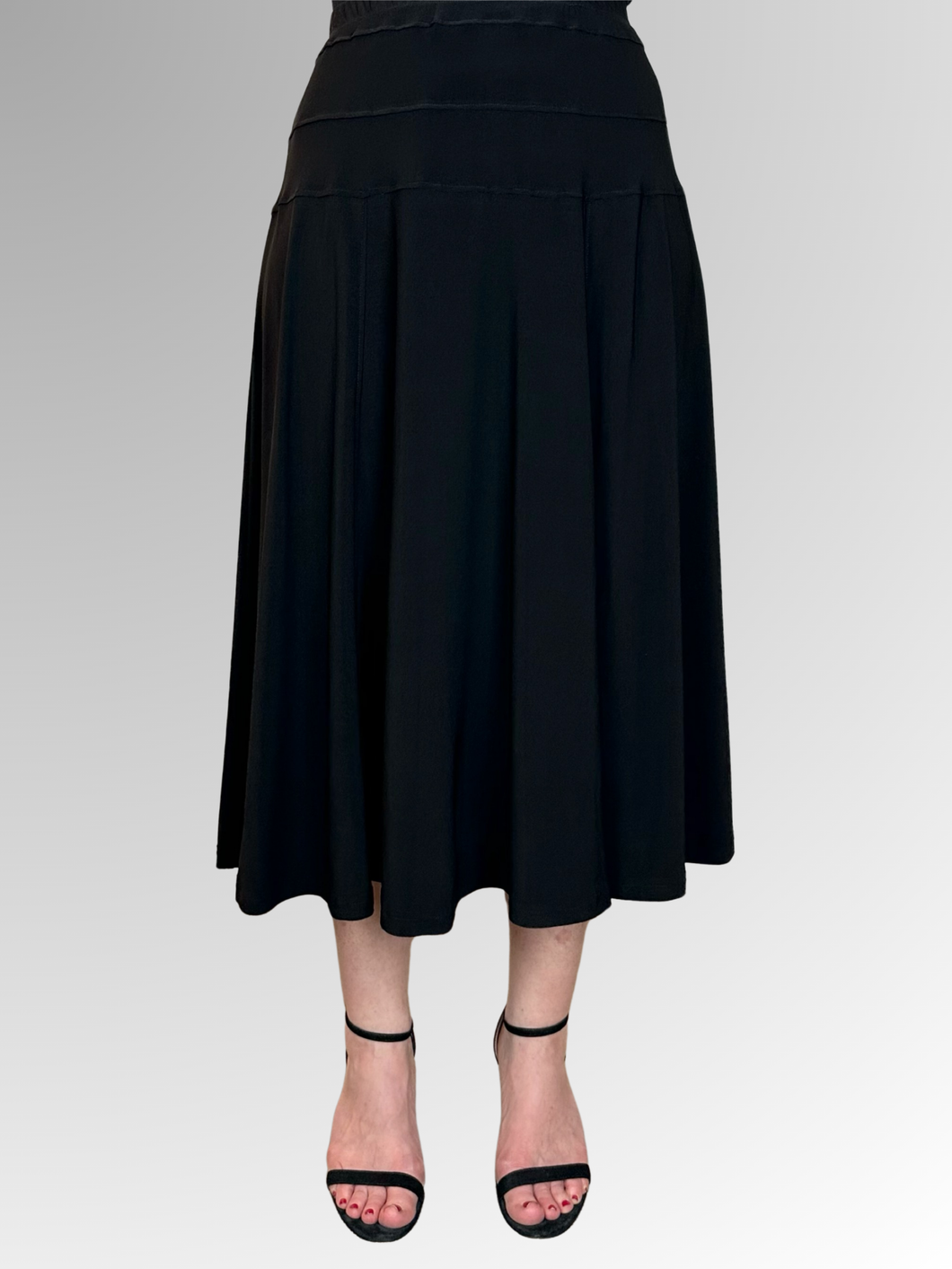 Expertly designed and crafted in Australia, the Corsican Classic Black Panelled Skirt effortlessly merges fashion and function. With six gores for fluid motion and a contoured waistband to enhance your silhouette, it provides the perfect stylish and comfortable option for any occasion. The lightweight and durable fabric, a blend of polyester and spandex, ensures effortless care and long-lasting wear. Invest in this timeless piece for a wardrobe staple that delivers both elegance and ease.