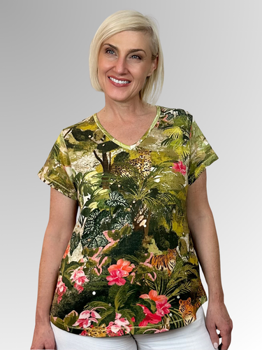 Transport yourself to exotic destinations with every wear in the charming Cecilia V-Neck Tee from Escape by Orientique. Adorned with eye-catching prints that spark adventure, this laid-back essential delivers comfort without compromise. The flattering V-neckline and breezy short sleeves create an effortlessly chic silhouette, while the relaxed fit ensures you can move freely whether you're exploring new horizons or dreaming of them. Crafted from a breathable cotton, rayon, and spandex blend that feels as go