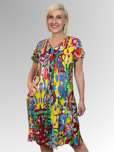 Stay cool and comfortable in the Ayangue Easy Fit Dress by Orientique. Made from organic crinkled cotton, this dress is lightweight and perfect for those hot summer days. The relaxed fit, V-neckline with button trim and pleat detailing add a touch of style, while the pockets make it practical for everyday wear. Ideal for lounging in the heat!