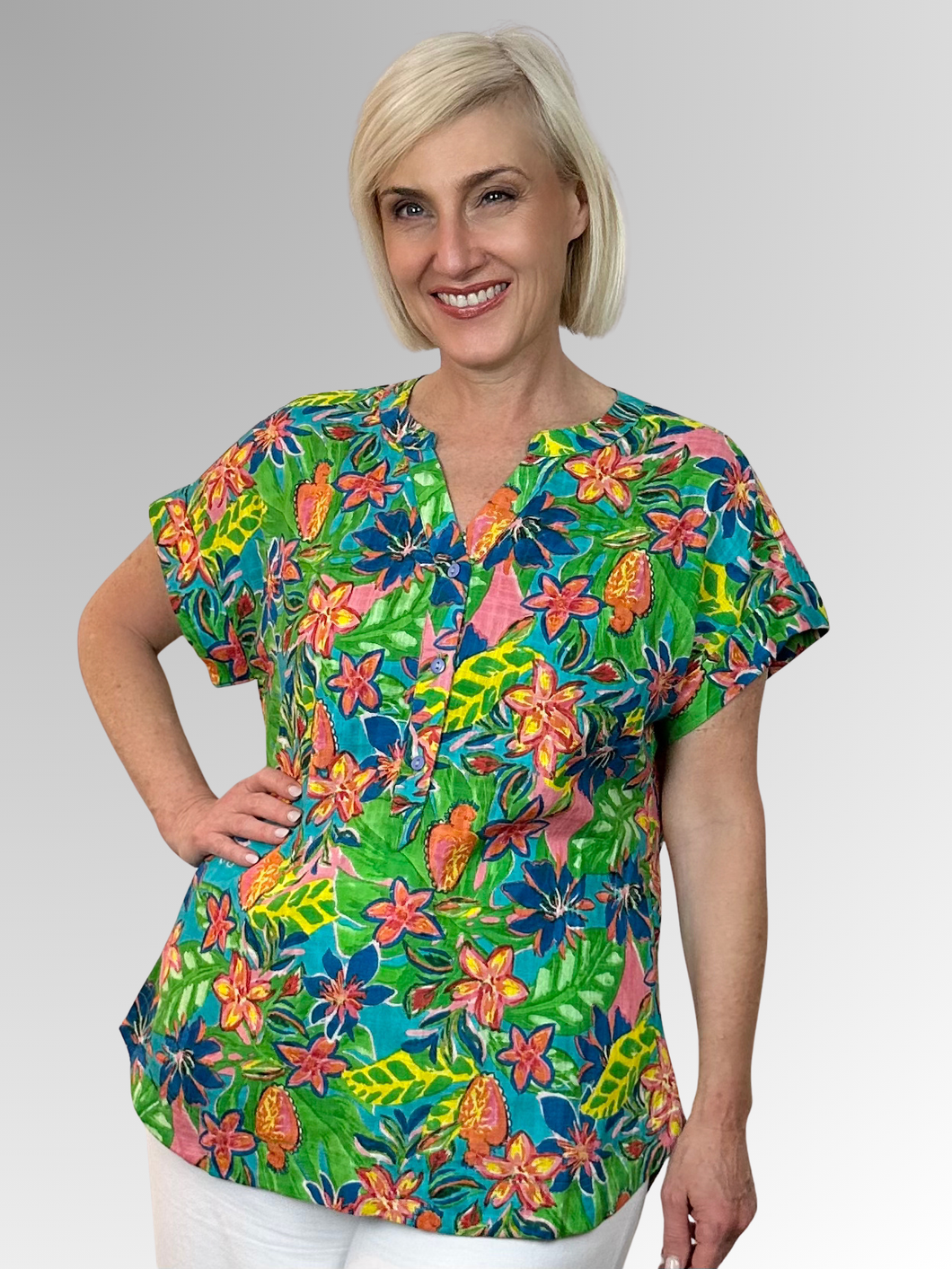 The Fortaleza Popover Top by Orientique is your ticket to effortless summer style. Made from Certified Organic Cotton, this lightweight piece breathes beautifully and keeps you feeling fresh all day long. The playful Nehru collar and three-button front add personality and edge to your everyday look, while the interesting floral print brings visual interest and flair. Perfect for anyone who wants to look fabulous without trying too hard.