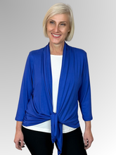 Our Bamboo Cardi is made from 95% Bamboo and 5% Spandex making it super light and silky soft.&nbsp;Being&nbsp;a breathable fabric it draws moisture away from your body keeping you cool. Available in a range of beautiful colours, you'll buy one and come back for more. Best of all, they’re&nbsp;"Made in Australia".