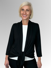 Our Bamboo Cardi is made from 95% Bamboo and 5% Spandex making it super light and silky soft.&nbsp;Being&nbsp;a breathable fabric it draws moisture away from your body keeping you cool. Available in a range of beautiful colours, you'll buy one and come back for more. Best of all, they’re&nbsp;"Made in Australia".