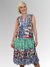 The Buzios V-Neck Sleeveless Dress is your summer essential; a playful blend of style, comfort and colour that works for every occasion. Featuring a flattering V-neckline and a charming tiered skirt, this dress moves beautifully and keeps you feeling cool. Made from rayon, it's wonderfully breathable and soft against your skin. Perfect for beach days, casual outings, or whenever you want to look effortlessly chic without overthinking it. Sleeveless and versatile, it's the kind of dress you'll reach for agai