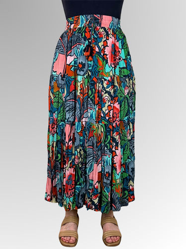 Move through the day in style with this lightweight and airy layered skirt! A perfect pairing of elastic waistband and tassel ties, all the better to show off the charming Cape Verde print of hand-drawn florals. Crafted from sustainable crinkled rayon, this piece will have you feeling cool all day!