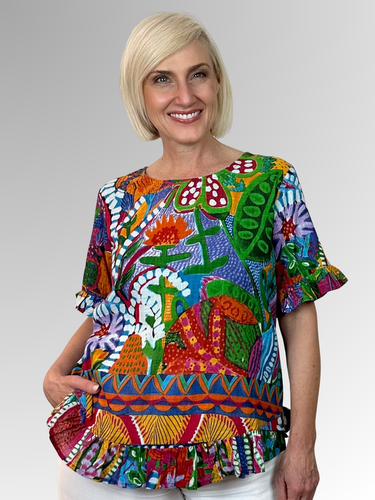 Made from soft organic cotton, the Ipanema Frill Top by Orientique features a relaxed A-line shape and generous fit for ultimate summer comfort. Playful frills adorn the hem and sleeves with a button-down back for an interesting twist. Hand-painted abstract florals in a beautiful mix of colour bring vibrant, artistic flair to sunny days and warm evenings. This top is your go-to for effortless, breezy style all summer long.