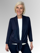 Our Bamboo Cardi is made from 95% Bamboo and 5% Spandex making it super light and silky soft.&nbsp;Being&nbsp;a breathable fabric it draws moisture away from your body keeping you cool. Available in a range of beautiful colours, you'll buy one and come back for more. Best of all, they’re&nbsp;"Made in Australia".