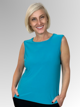 Our Classic Cami is the perfect addition to your basic collection. Available in 10 colours, you’ll find it’s just the piece you need for under all your jackets. Made in Australia from Poly/Spandex, it’s easy to care for and ideal for travelling!